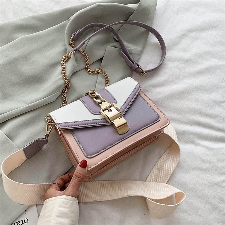 Damenhandtasche aus Leder, zweifarbig, mit Kettengurt, modisch, elegant, für Alltag und Büro.