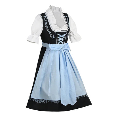 Schwarzes Dirndl mit blauer Schürze und weißer Bluse, traditionelles bayerisches Trachtenkleid.