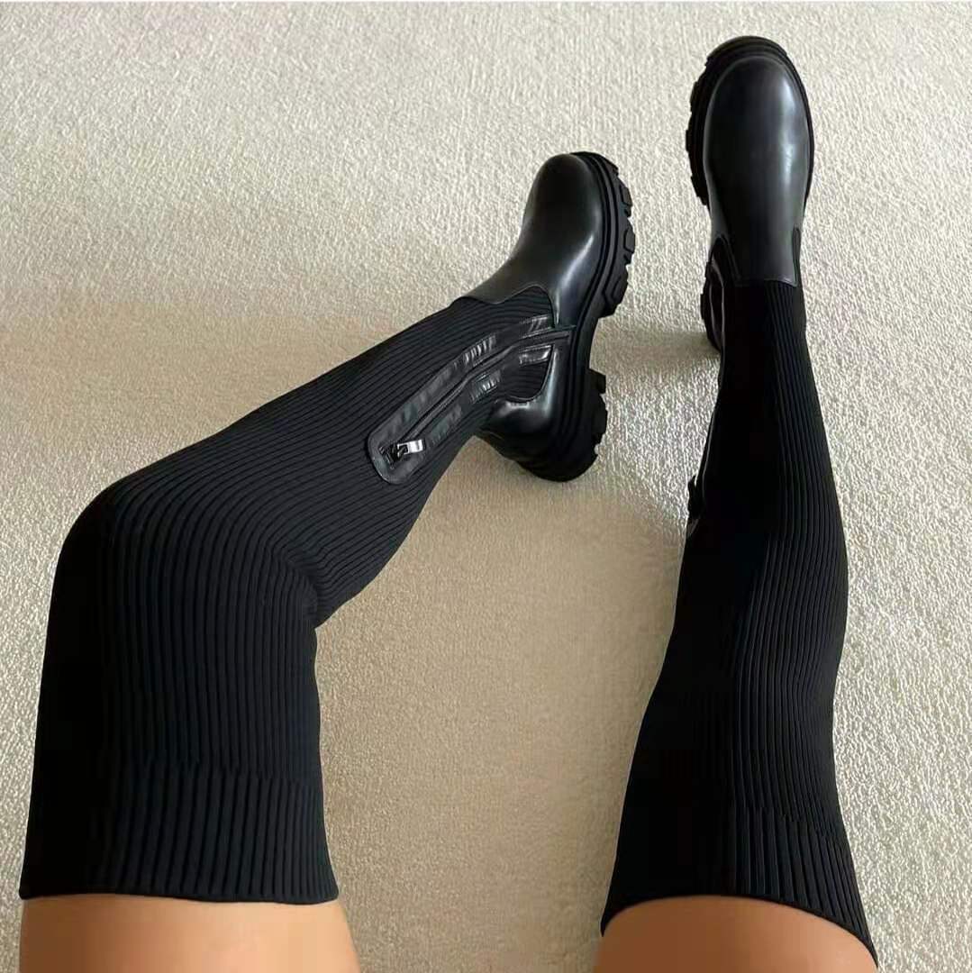 Schwarze kniehohe Stiefel mit Reißverschluss, gerippter Stoff, modisch, Damenmode.