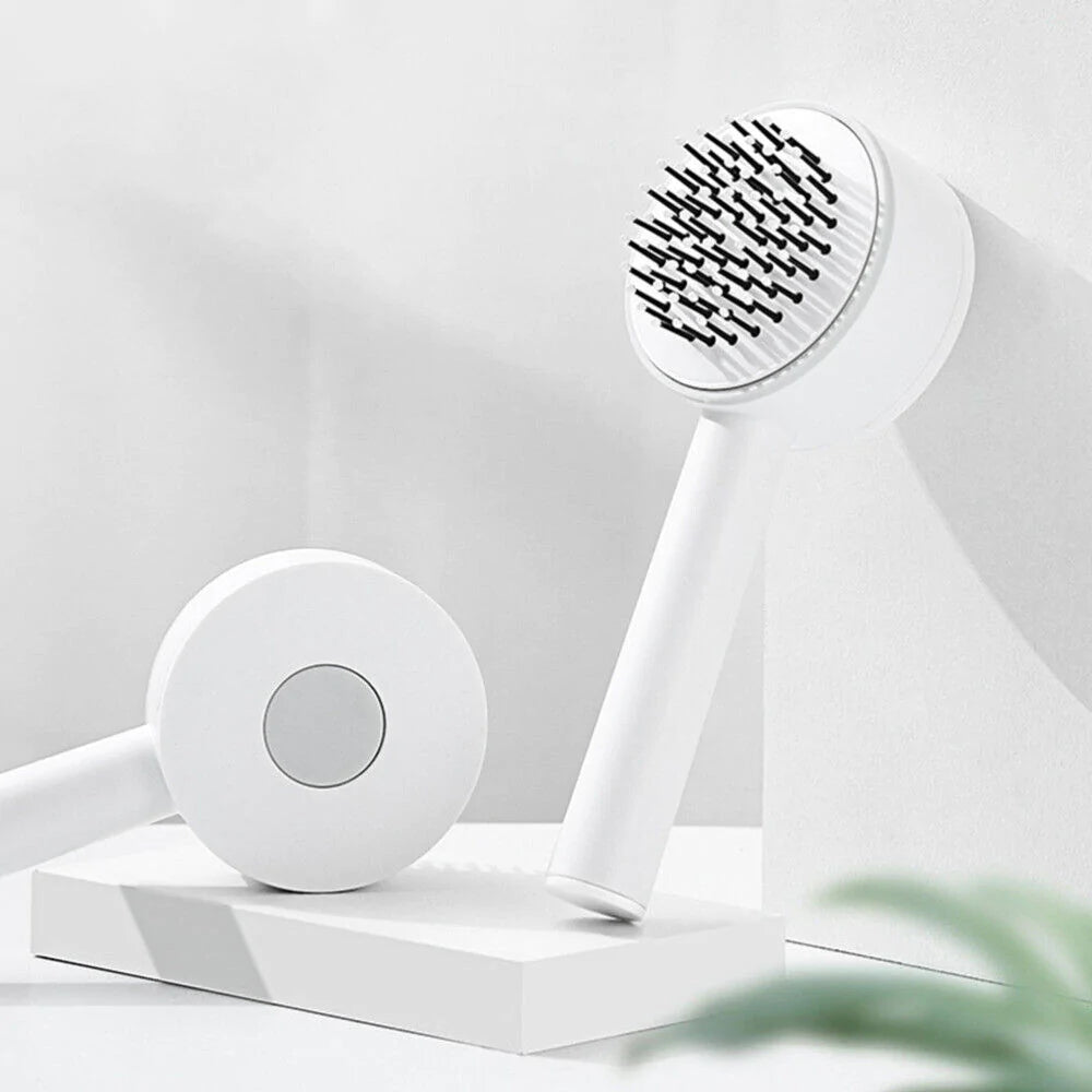 Weißer elektrischer Kopfmassagegerät mit Borsten, ergonomisches Design, Entspannung, Wellness.