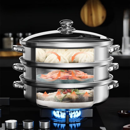 Dreistöckiger Edelstahl-Dampfgarer mit Glasdeckel, ideal für gesundes Kochen auf Gasherd.