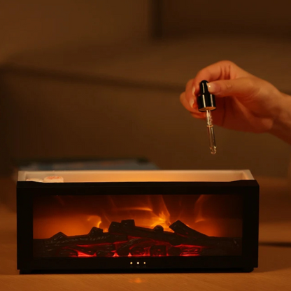 Hand hält Pipette über elektrische Duftlampe mit Flammeneffekt, schwarz, Aromatherapie.