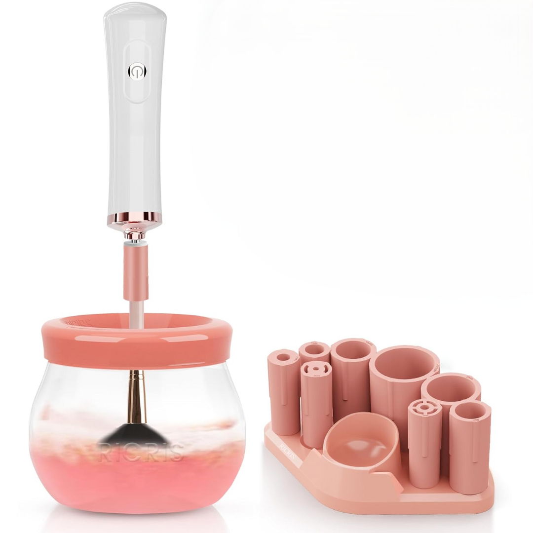 Elektrischer Make-up-Pinselreiniger, rosa, mit Halterung, für schnelle und gründliche Reinigung.