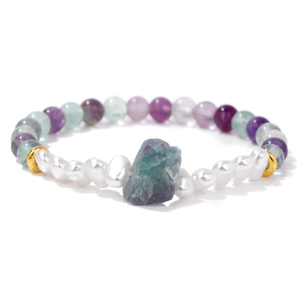 Armband mit bunten Edelsteinen, Perlen und goldenen Akzenten, handgefertigt, modisch, elegant.