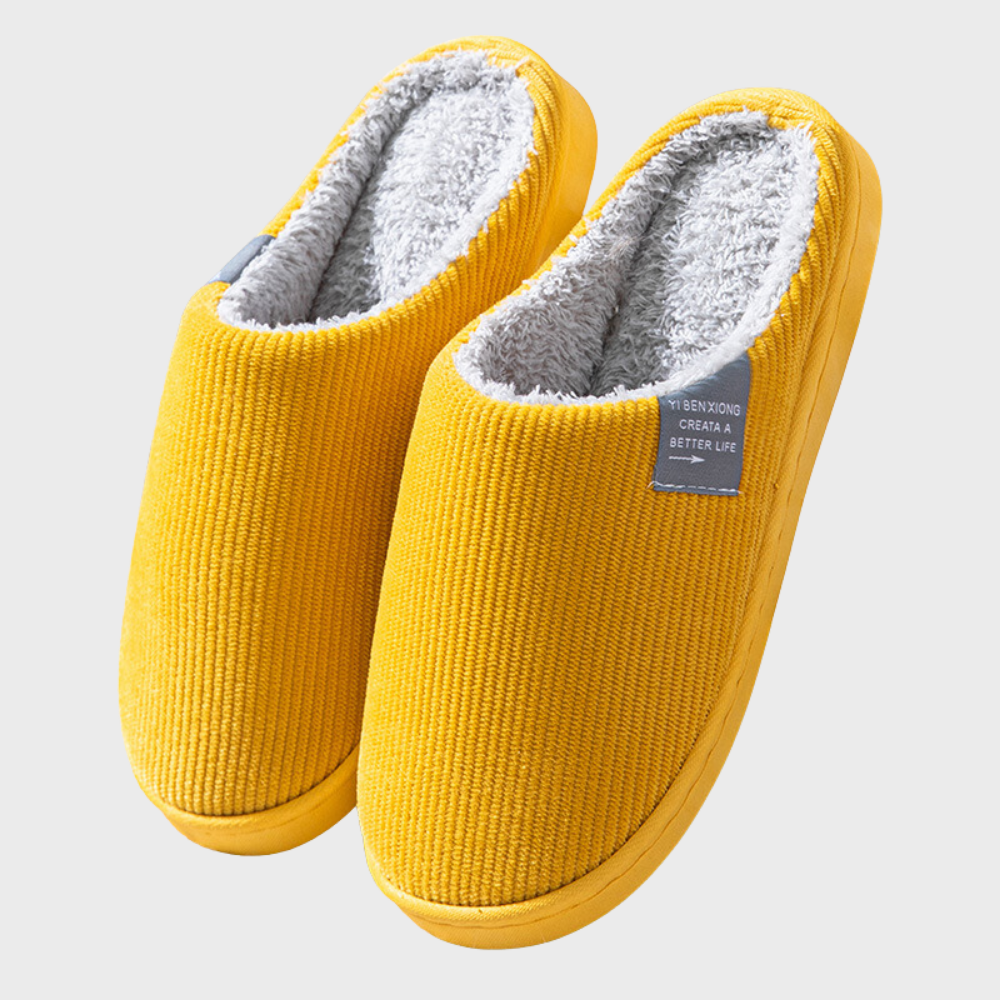 Gelbe Hausschuhe aus Cord mit weichem Futter, rutschfeste Sohle, gemütlich und warm.