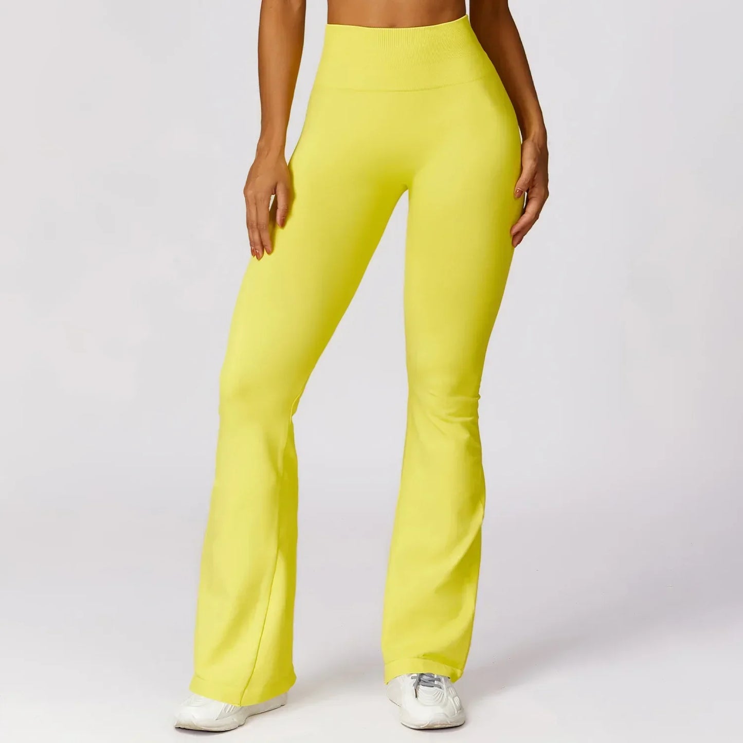 Gelbe Damen-Yoga-Leggings mit Schlag, hoch tailliert, bequem, elastisch, ideal für Sport.