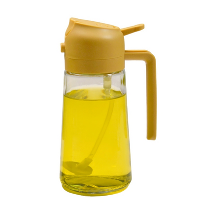 Gelber Ölspender aus Glas mit Kunststoffdeckel und Griff, ideal für Küche und Esszimmer.