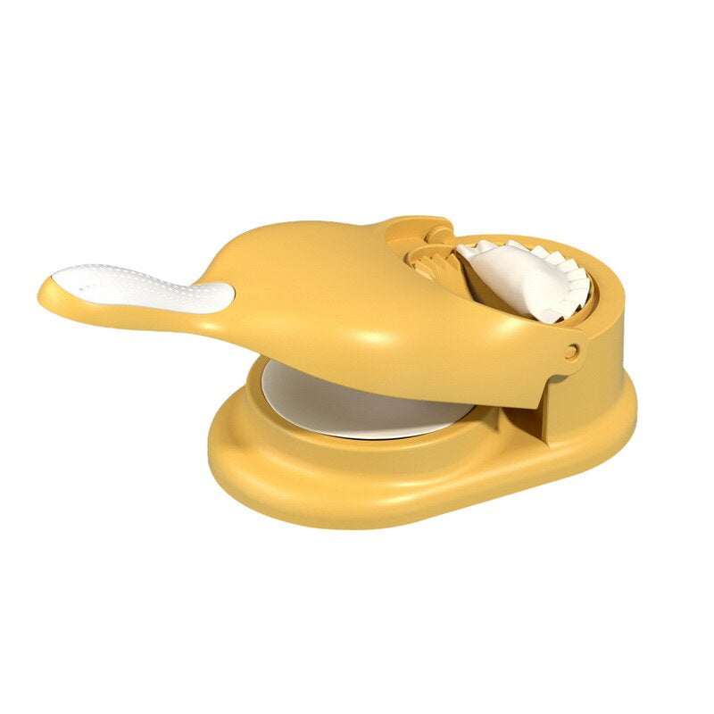 Gelber Teigtaschenformer aus Kunststoff mit Griff, ideal für Ravioli und Dumplings.
