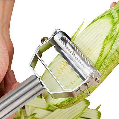 Edelstahl-Gemüseschäler schält Zucchini, ergonomischer Griff, scharfes Klingen-Design.