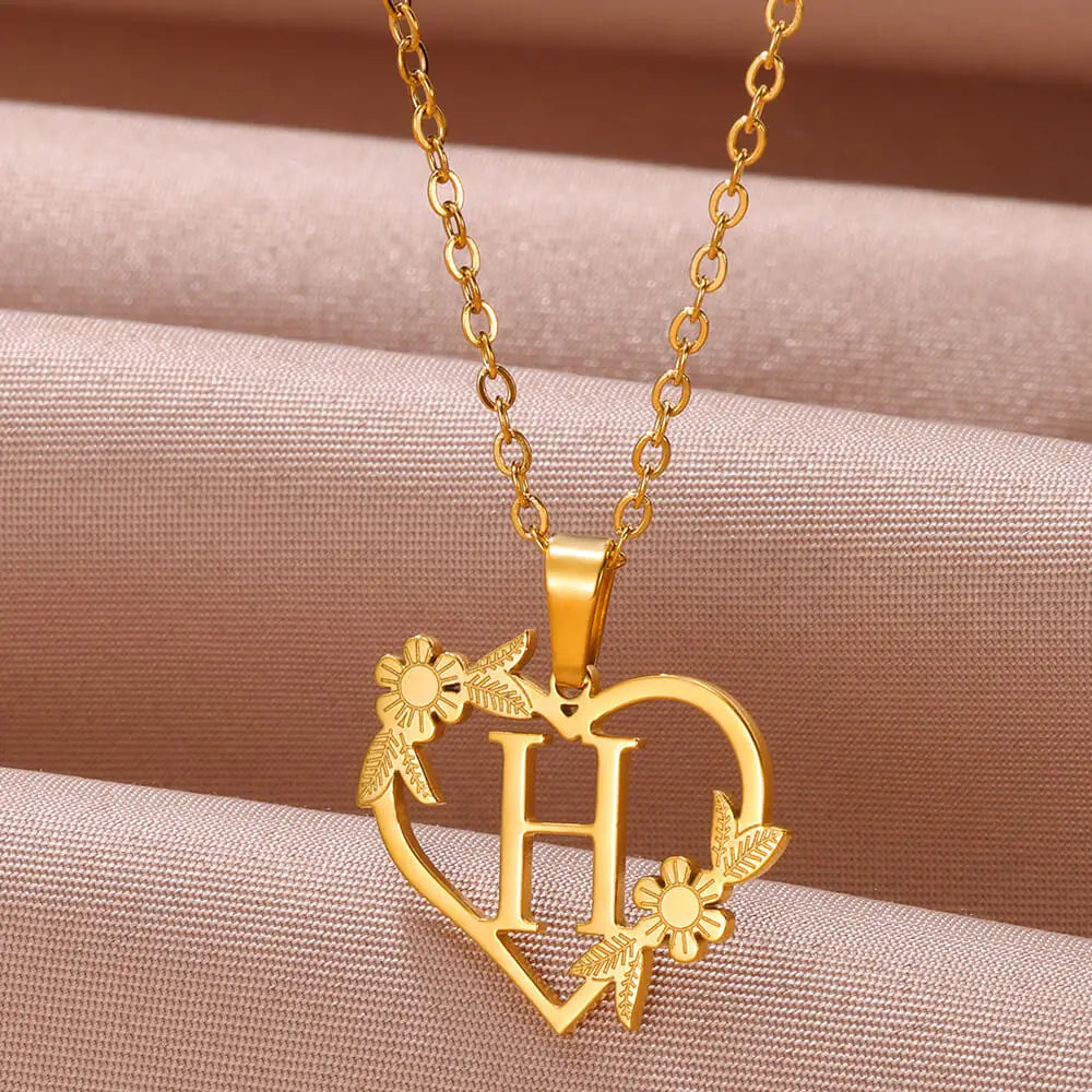 Goldene Herz-Halskette mit Buchstabe H und Blumen, personalisierter Schmuck, Geschenkidee.
