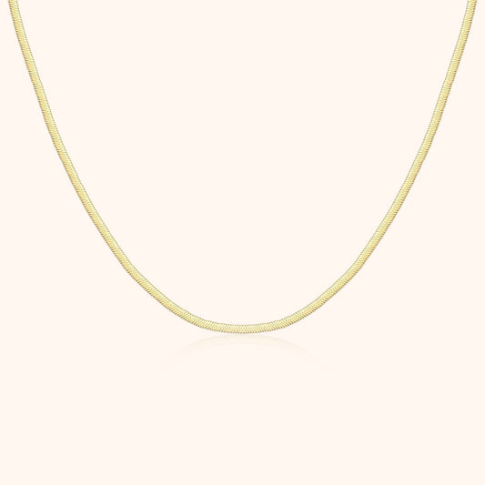 Goldene Schlangenkette, 18 Karat, elegantes Design, Schmuck für Damen, luxuriöses Accessoire.