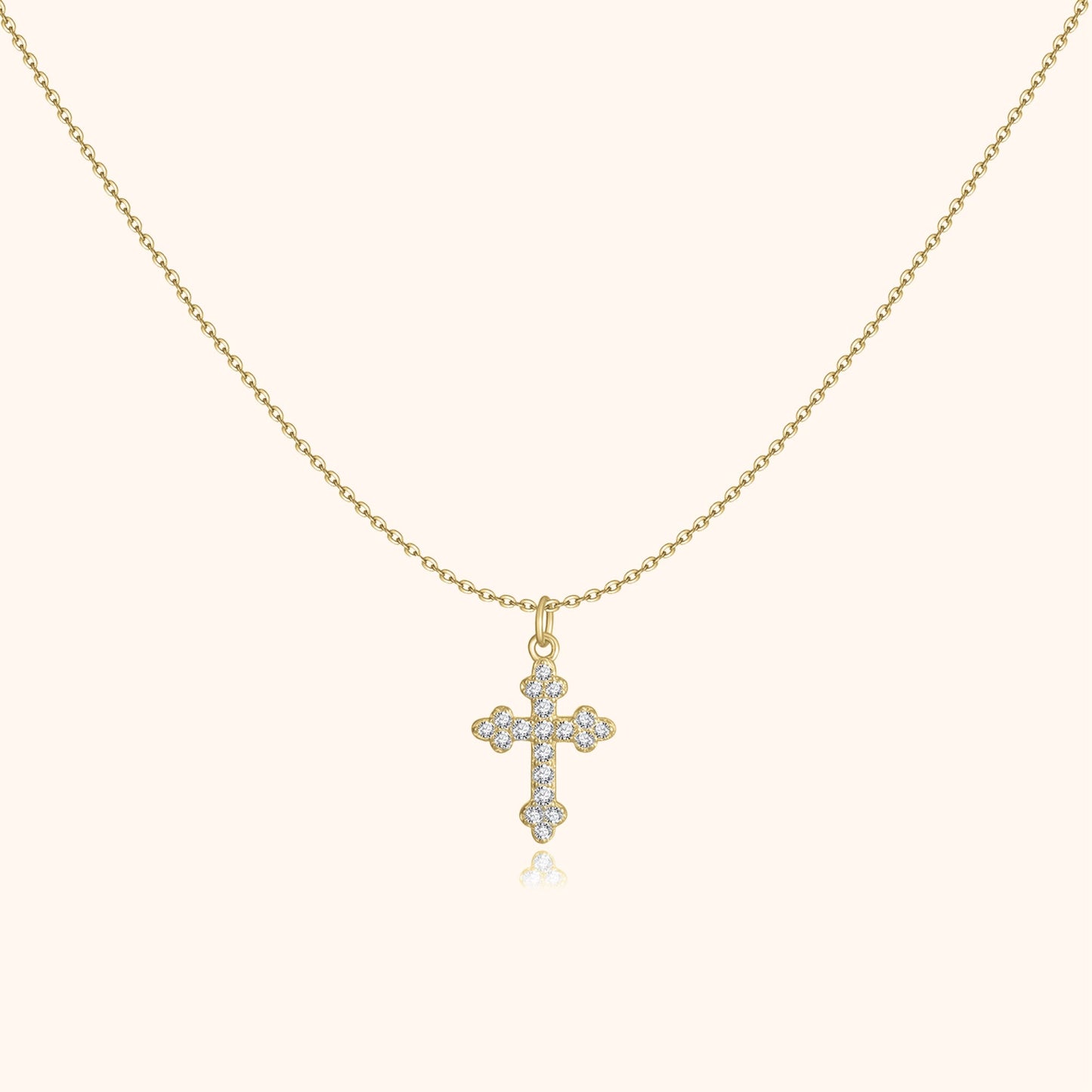 Goldene Halskette mit Kreuzanhänger, besetzt mit Diamanten, eleganter Schmuck für Damen.