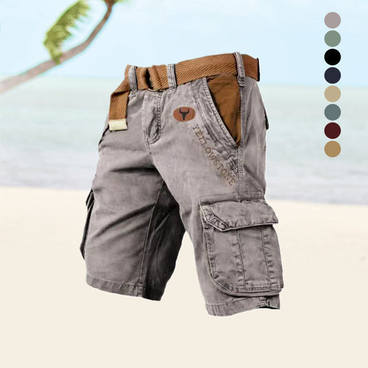 Graue Cargo-Shorts aus Baumwolle mit Taschen, ideal für Outdoor-Aktivitäten am Strand.