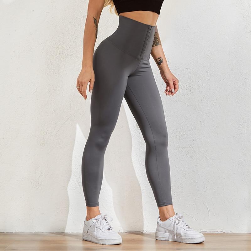 Graue, hoch taillierte Shaping-Leggings für Damen, figurformend, bequem, Sportmode.