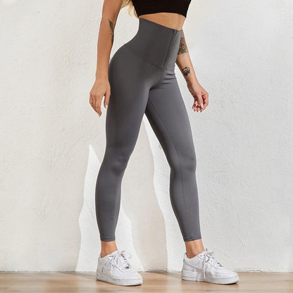 Graue, hoch taillierte Shaping-Leggings für Damen, figurformend, bequem, Sportmode.