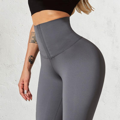 Graue, figurformende Leggings mit hohem Bund, Damenmode, Fitnessbekleidung, elastisch.