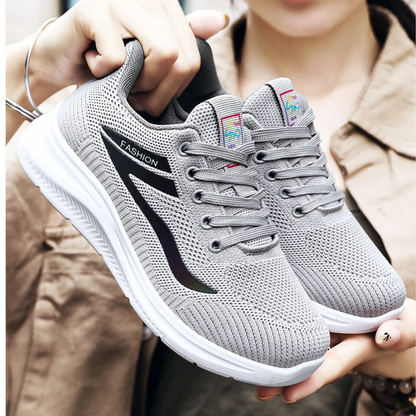 Graue Sportschuhe mit weicher Sohle, atmungsaktives Mesh, modisches Design, Damen Sneaker.