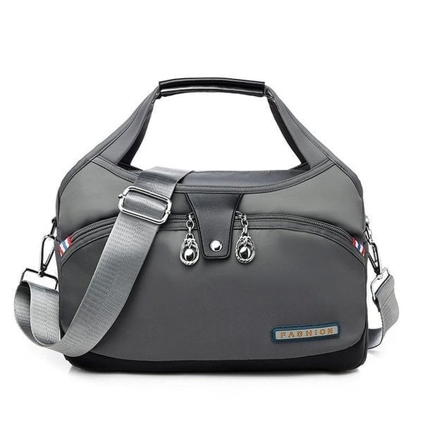Graue Reisetasche mit Schultergurt, Reißverschlüssen, modisch, strapazierfähig, Unisex.