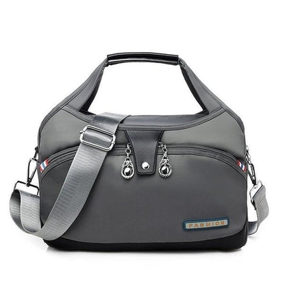 Graue Reisetasche mit Schultergurt, Reißverschlüssen, modisch, strapazierfähig, Unisex.