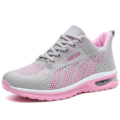 Grauer und rosa Damen-Sneaker, atmungsaktiv, mit Luftpolstersohle, ideal für Sport und Freizeit.