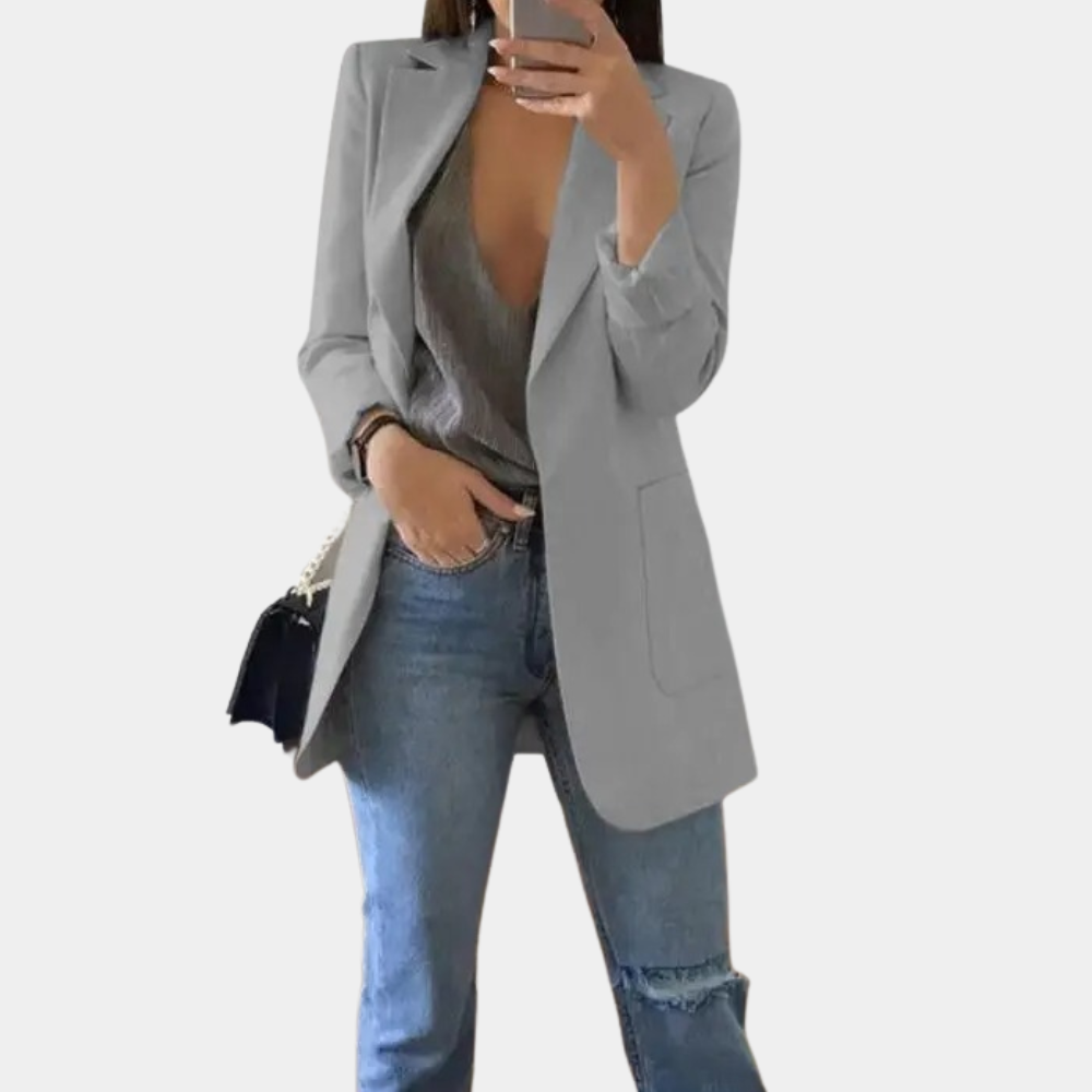 Grauer Damenblazer, elegant, lang, mit Taschen, kombiniert mit Jeans, modisch, Business-Look.