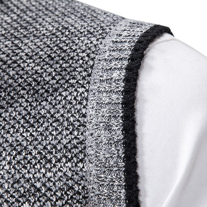 Grauer Strickstoff, Nahaufnahme, Textur, Detailansicht, hochwertige Materialien, Mode, Bekleidung.