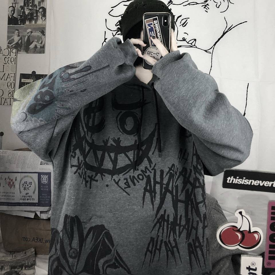 Grauer Oversize-Pullover mit schwarzem Graffiti-Design, Unisex Streetwear, Baumwolle.