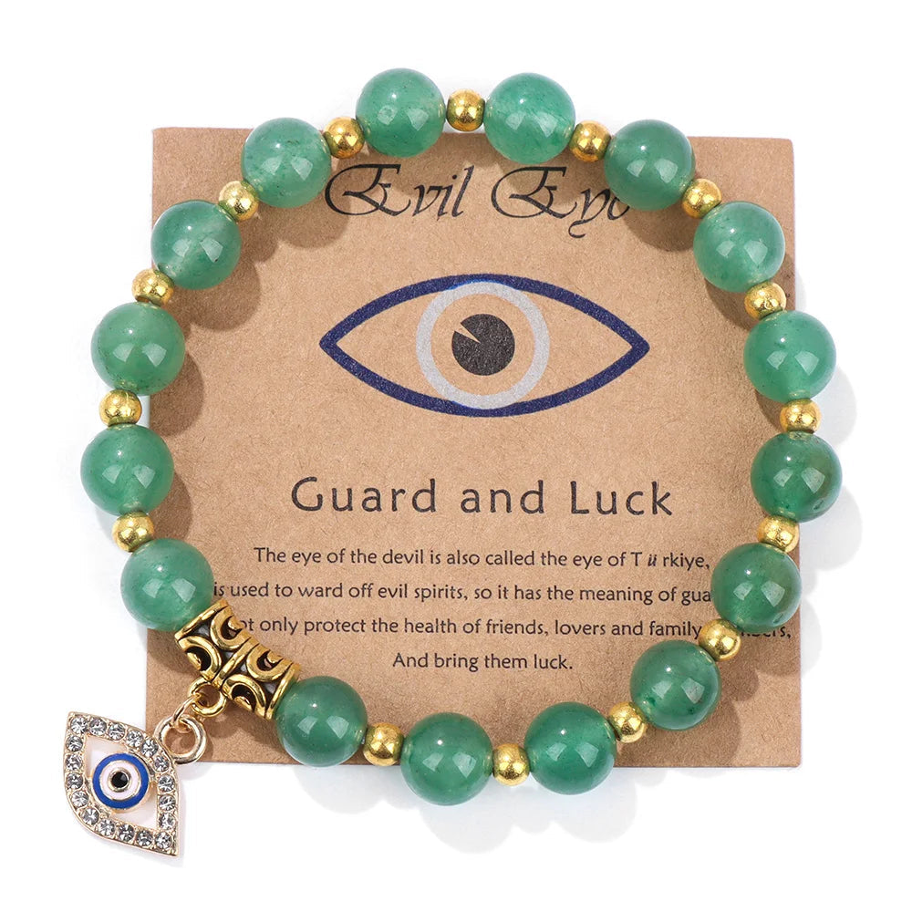 Grünes Aventurin-Armband mit goldenen Perlen und Nazar-Anhänger für Schutz und Glück.