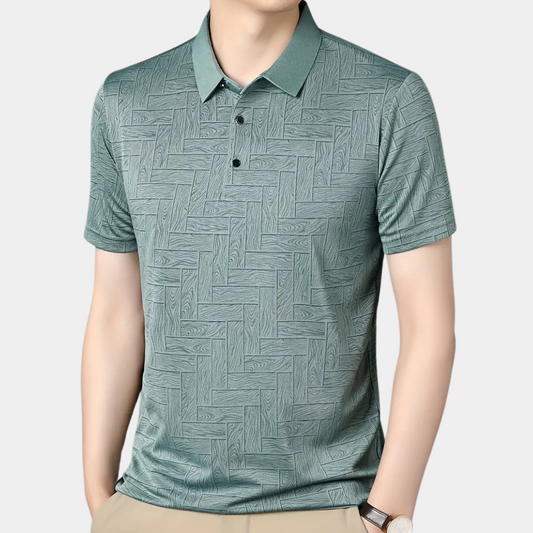 Grünes Herren-Poloshirt mit geometrischem Muster, kurzärmelig, aus Baumwolle.