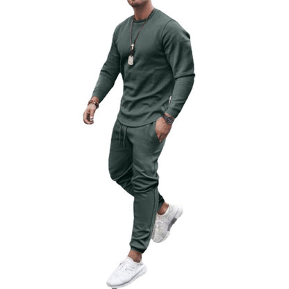 Grüner Herren Jogginganzug, langärmelig, bequem, sportlich, Freizeitkleidung.
