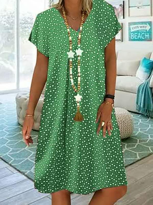 Grünes Sommerkleid mit weißen Punkten, V-Ausschnitt, lässig, Damenmode, Strandkleidung.
