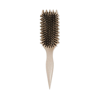 Beige Haarbürste mit Naturborsten, ergonomischer Griff, ideal für tägliche Haarpflege.