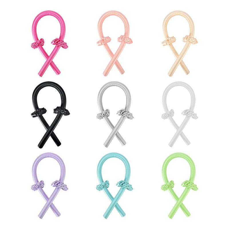 Neun bunte, flexible Haargummis in verschiedenen Farben, ideal für Haarstyling und Accessoires.