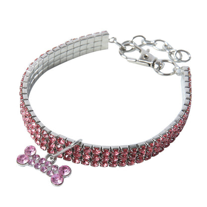 Rosa Hundehalsband mit Strasssteinen und Knochenanhänger, verstellbar, modisch.