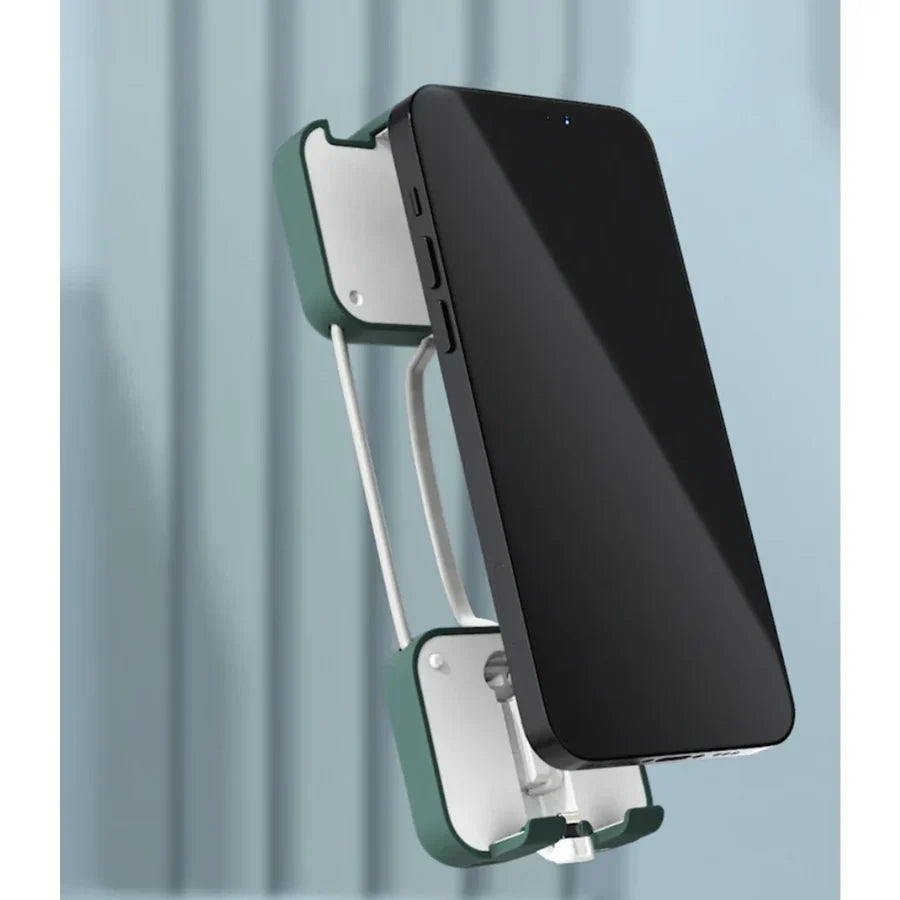 Grüne Handyhalterung aus Metall, Wandmontage, für Smartphones, modernes Design, platzsparend.