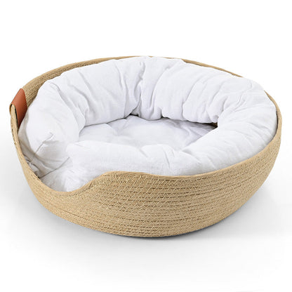 Handgewebtes Bambus-Haustierbett, rund, beige, mit weißem Kissen, gemütlich und stilvoll.