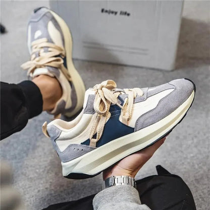 Grauer Sneaker Herren, Casual-Stil, elastisch, Leder, bequeme Freizeitschuhe, modisch.