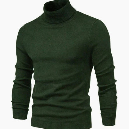 Dunkelgrüner Rollkragenpullover, schräg fotografiert, mit gerippten Bündchen und schmal geschnittenen langen Ärmeln 5