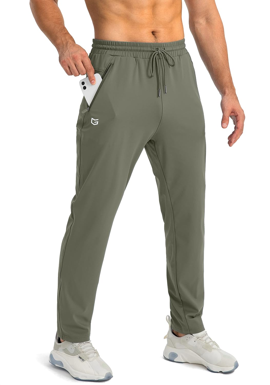 Männer Jogginghose olivgrün, elastisch, mit Taschen, ideal für Sport und Freizeit.
