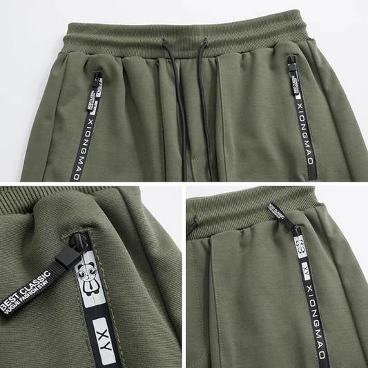 Grüne Jogginghose mit Reißverschlusstaschen, XIONGMAO-Logo, Baumwolle, Herrenmode.