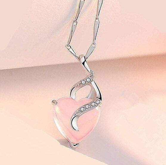 Silberne Herz-Halskette mit rosa Opal und Zirkonia, elegantes Schmuckdesign.