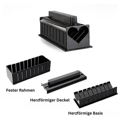 Schwarze Sushi-Rollform mit herzförmigem Deckel und fester Basis, Kunststoff, Küchenzubehör.