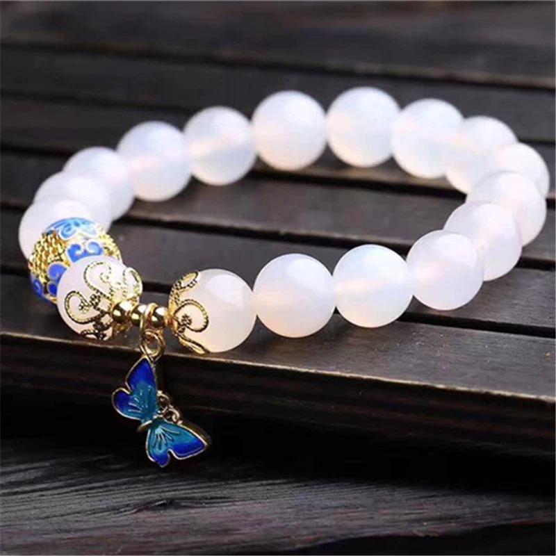 Weiße Achat-Perlenarmband mit blauem Schmetterlingsanhänger, 10 mm, elegant, Schmuck.