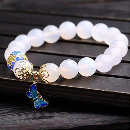 Weiße Achat-Perlenarmband mit blauem Schmetterlingsanhänger, 10 mm, elegant, Schmuck.