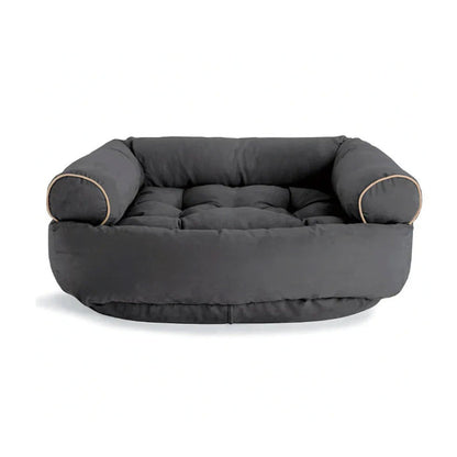Graues Hundebett aus Stoff mit erhöhten Seiten, bequemes Design, ideal für mittelgroße Hunde.