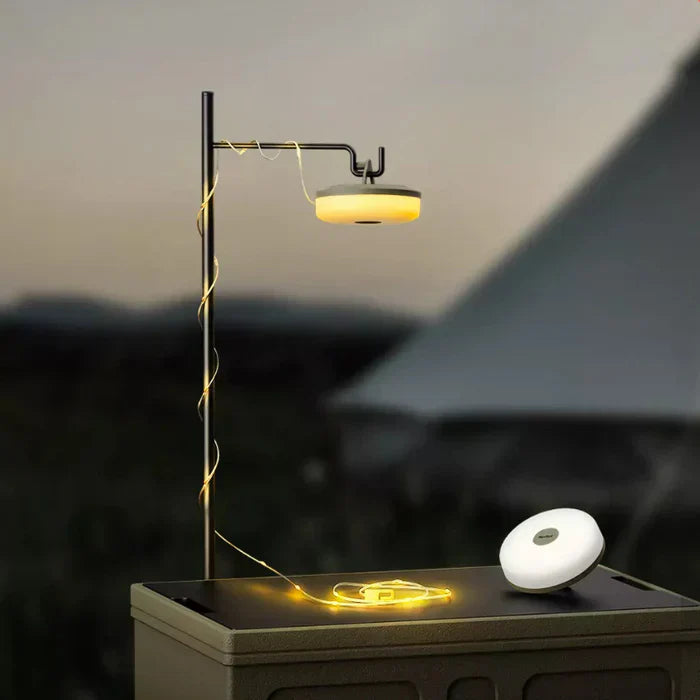 Schwarze LED-Campinglampe mit gelbem Licht, tragbar, Outdoor-Beleuchtung, modernes Design.
