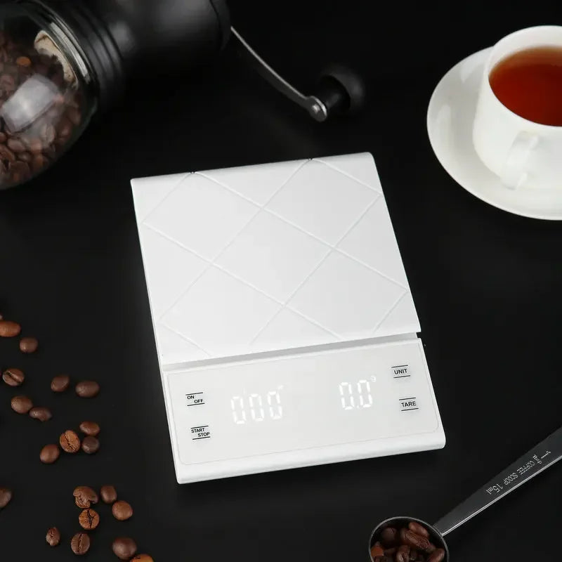 Digitale Küchenwaage mit Timer, weiß, max. 5kg, Genauigkeit 0,1g, ideal für Kaffeezubereitung.
