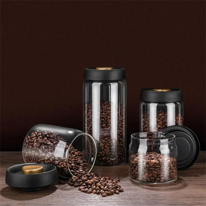 Glasbehälter mit Kaffeebohnen, schwarz-goldener Deckel, Küchendekor, Vorratsglas-Set.