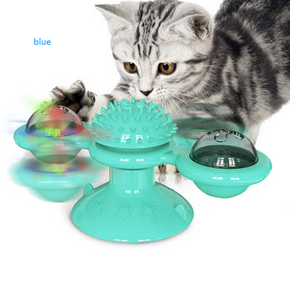 Katzenspielzeug blau, interaktiv, mit rotierenden Kugeln und Noppen, für Unterhaltung und Bewegung.
