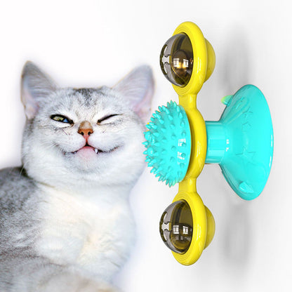 Katzenspielzeug mit Saugnapf, gelb-blau, interaktiv, mit Spikes und drehbaren Kugeln.